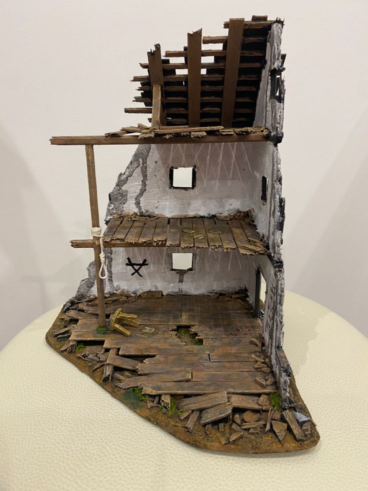 a model of a house made out of wood