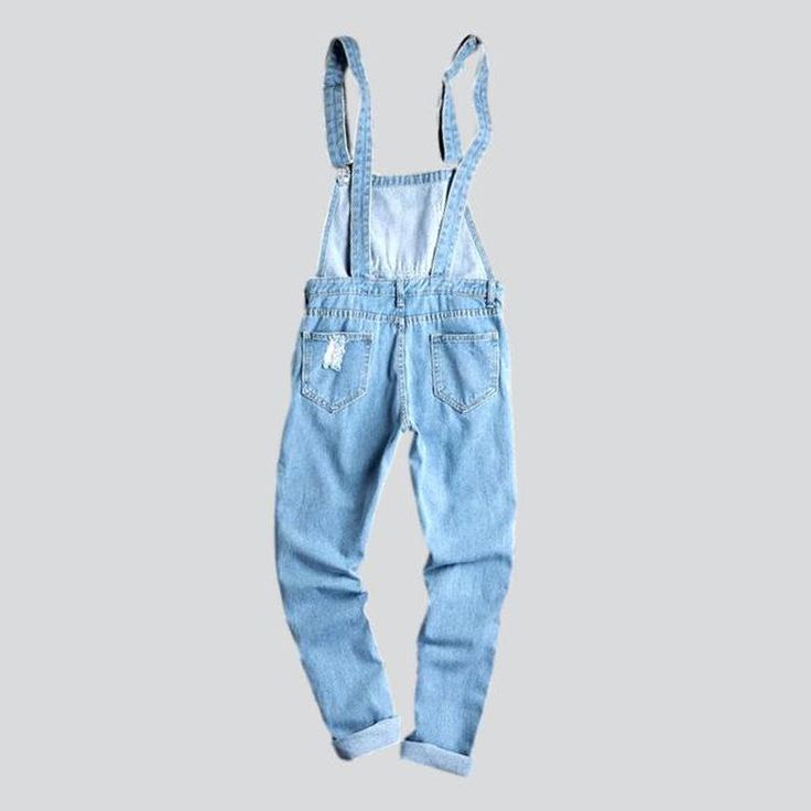 Introducing the 2023 Spring-Summer Collection ââ‚?the street-style ripped light blue denim jumpsuit! This edgy piece of apparel is the perfect combination of contemporary fashion and nostalgic grunge. With its distinctive features. it's sure to turn heads and make a statement!Distinctive Features: Ripped & Ready: Crafted with distressed detailing for an effortlessly cool attitude. Slim Fit: Designed to hug your silhouette while ensuring comfort. Suspender Closure: A unique blend of a resilient z Clear Weather, Cool Attitude, Jumpsuit Online, Current Fashion Trends, Light Blue Denim, Light Blue Color, Denim Jumpsuit, Contemporary Fashion, Suspenders