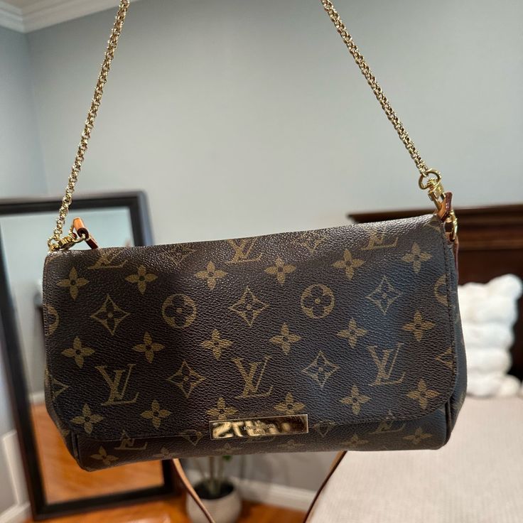 I’m Selling My Lv Pochette Crossbody In Very Good Condition. The Bag Is In Very Good Condition No Fading Or Wear. The Chain Is Still Shiny. The Strap Is Honey Color And Worn. Monogram Canvas Clutch For Everyday Use, Daily Use Monogram Canvas Flap Bag With Removable Pouch, Everyday Luxury Monogram Canvas Shoulder Bag With Detachable Strap, Luxury Everyday Monogram Canvas Shoulder Bag With Detachable Strap, Monogram Canvas Clutch Shoulder Bag With Removable Pouch, Monogram Canvas Clutch Shoulder Bag, Rectangular Monogram Canvas Shoulder Bag With Chain Strap, Travel Shoulder Bag With Chain Strap And Monogram Canvas, Monogram Canvas Shoulder Bag With Chain Strap For Travel