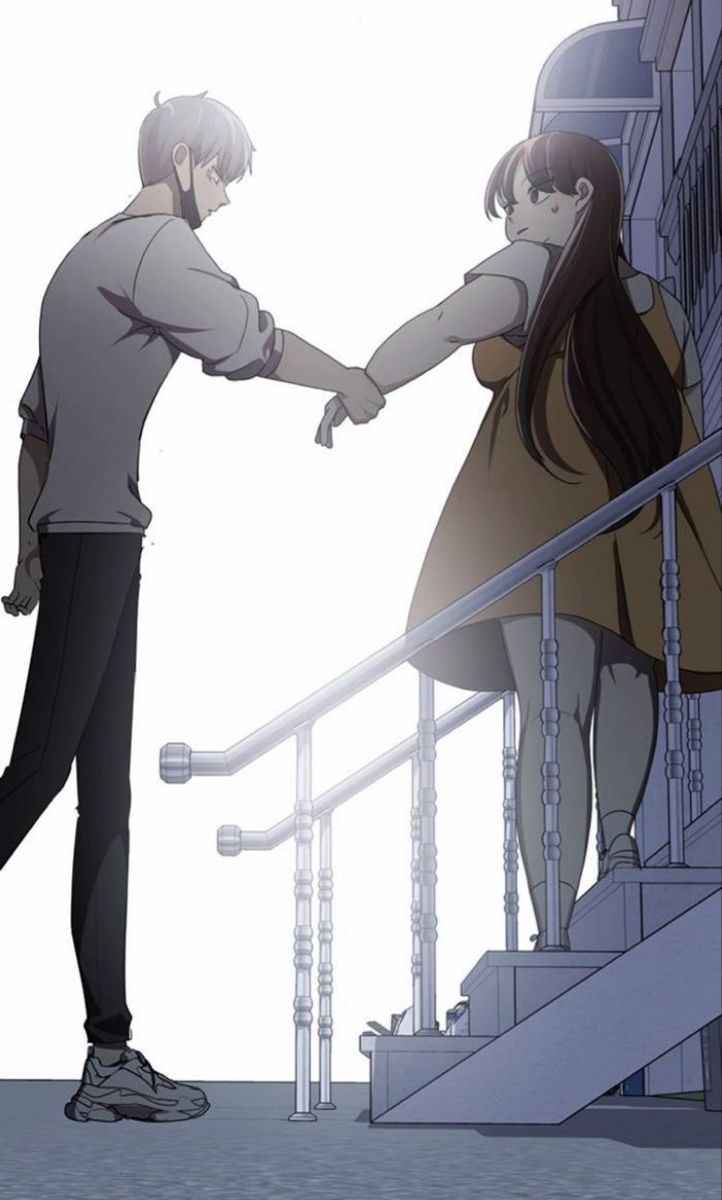 two people are shaking hands on the stairs