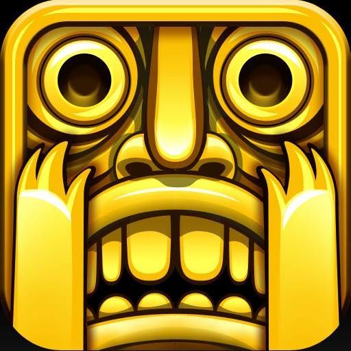 a golden tiki mask with big eyes and an angry look on it's face