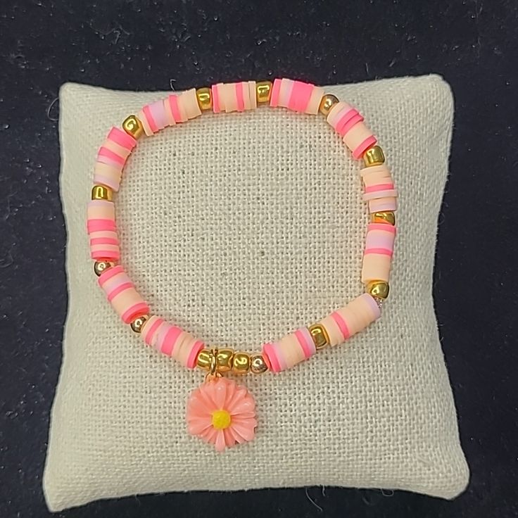 Bracelet Pink Orange Clay Heishi Beads Gold Floral Charm Handmade Gift Small Fun Brand New. Handmade With Love In Las Vegas, Nv. Ships In A Beautiful Pouch. I'd Love To Accept Your Offer! Smoke-Free Seller. Fast Shipping. Trusted Long Time Seller. All Items Are In Euc Unless Otherwise Stated. Thank You For Shopping Liscel Styles. Follow Along On Instagram @Liscelstyles Beautiful Boho Hippie Festival One Of A Kind Cool Coachella Birthday Gift 90s 80s 70s 60s Resort Bohemian Retro Travel Casual Sp Pink Hand-strung Beaded Bracelets For Beach, Adjustable Peach Beaded Bracelets As Gift, Pink Hand-strung Stretch Bracelet For Beach, Adjustable Peach Beaded Bracelet As Gift, Pink Stretch Bracelet With Heart Beads For Beach, Pink Heishi Beads Jewelry With Spacer Beads, Pink Tiny Beads Friendship Bracelets As Gift, Pink Tiny Beads Friendship Bracelet As Gift, Pink Bohemian Stretch Bracelet With Letter Beads