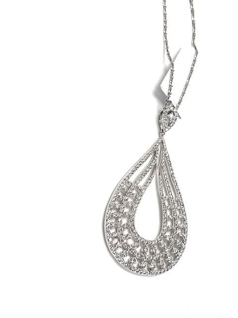 Glimmer is our 14K Gold and Diamond Hefty Tear-Drop Pave necklace. Bijoux that will lead exclusively to divine destinations. Genuine Brilliant Cut Round Diamonds are SI clarity and G/H in color at approximately 1.75CT. They are carefully hand set in a 14K Gold high polished pear shape substantial pendant setting. 16"-17"-18" Adjustable Chain. Chandelier Big, Pear Pendant, Pave Necklace, Big Necklace, Pave Setting, Drop Pendant, G H, High Jewelry, Tear Drop