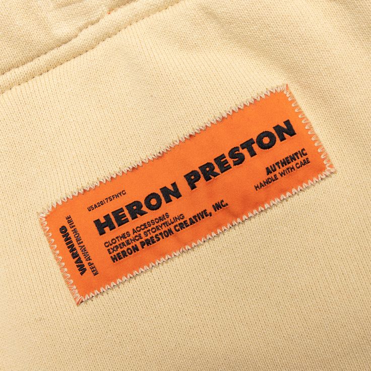 The Sweatshorts CTNMB Pixel Warp is a must-have from Heron Preston’s latest apparel delivery. Composed of cotton, the silhouette includes an elastic waistband with in-seam side pockets and a rear welt pocket. A logo patch resides at the rear, with additional screen-printed branding at the front for a finished look. 100% cotton Elastic waistband Side pockets Rear welt pocket Woven patch Screen-printed branding Style No: HMCI007S22JER0016155 HMCI007S22JER0016155 Cute Clothing Tags, Woven Tag Design, Clothing Label Ideas, Label On Clothes, Clothing Brand Tags, Clothing Tag Ideas, Clothing Label Design, Apparel Packaging, Branding Clothing