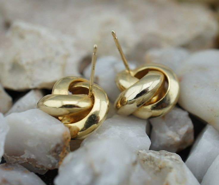 This is the perfect option for those who like cool, unique jewelry and the luxury, velvet shine of gold. This is the perfect option for those who like cool, unique jewelry and luxury. The stud earrings have the shape of a triple ring. It is perfect for a gift for a birthday, mother's day, and holidays. ❤️ The earrings are about 2/4'' in diameter. ❤️ There is a hallmark: 14k. ❤️The weight is about 3.8g. The earrings do not have solid gold push-backs. I can offer non-gold pushbacks. Everyone inter Gold Ring-shaped Wedding Earrings, Yellow Gold Ring Earrings For Wedding, Wedding Rings In Yellow Gold With Matching Earrings, Yellow Gold Wedding Rings With Matching Earrings, Elegant Gold Ring Earrings, Yellow Gold Ring Earrings For Anniversary, 14k Gold Rings With Matching Earrings, Anniversary Yellow Gold Ring Earrings, Triple Ring