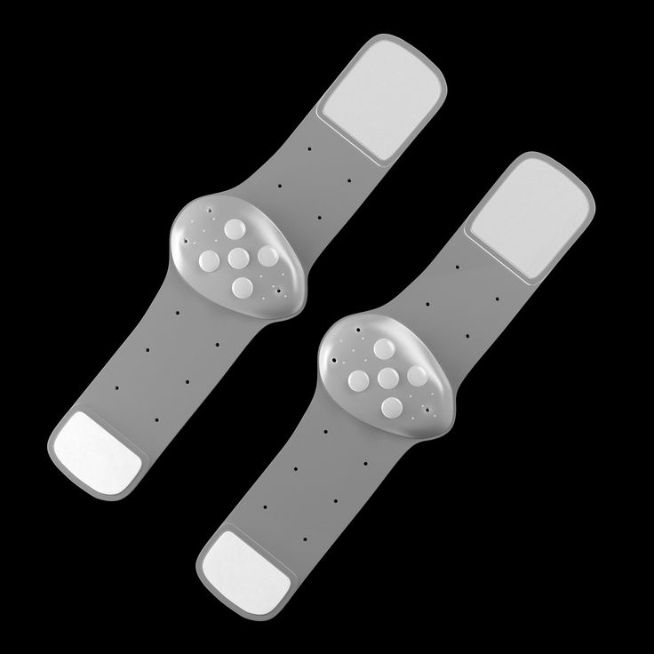 two white wristbands are shown on a black background