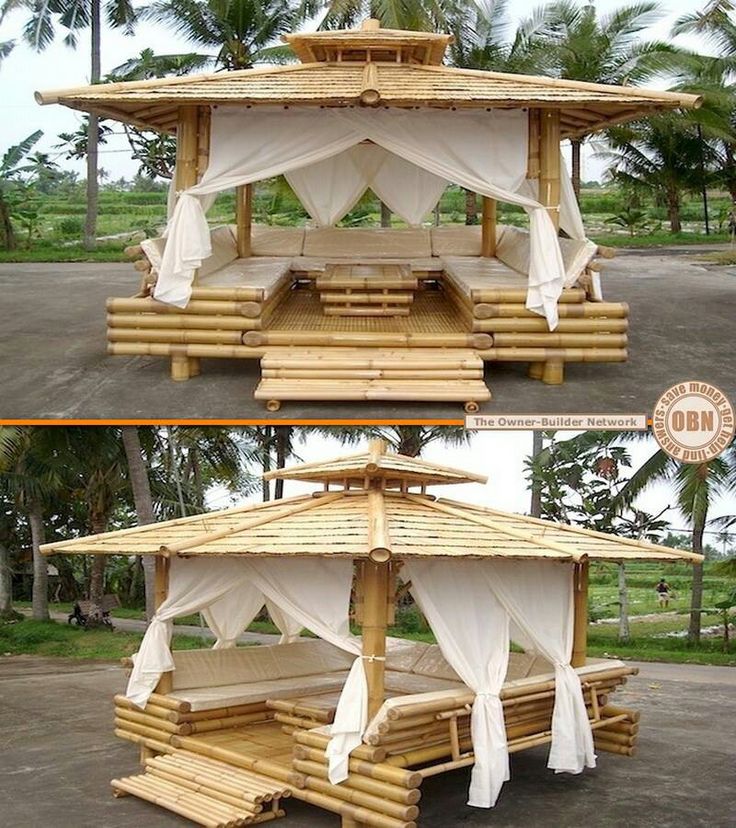 a gazebo made out of wood and white drapes on the roof is shown