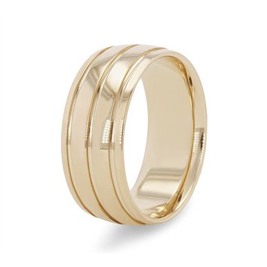 a gold wedding ring with three thin lines on it