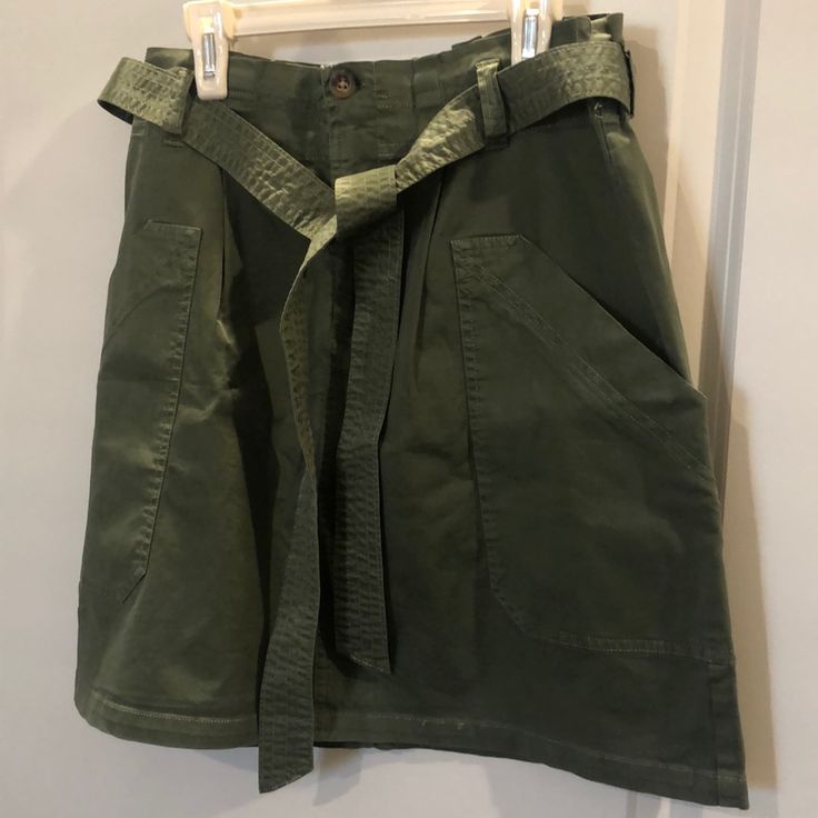 Green Military Skirt From Abercrombie & Fitch 98% Cotton 2% Elastane Machine Wash Cold Separately/Tumble Dry Low Belted Cotton Cargo Skirt, Casual Belted Cargo Skirt For Summer, Casual Workwear Skirt With Tie Waist, Casual Belted Skirt, Spring Utility Style Belted Skirt, Green Utility Skirt For Spring, Casual Belted Skirt Bottoms, Casual High Waist Belted Cargo Skirt, Green Utility Skirt For Summer