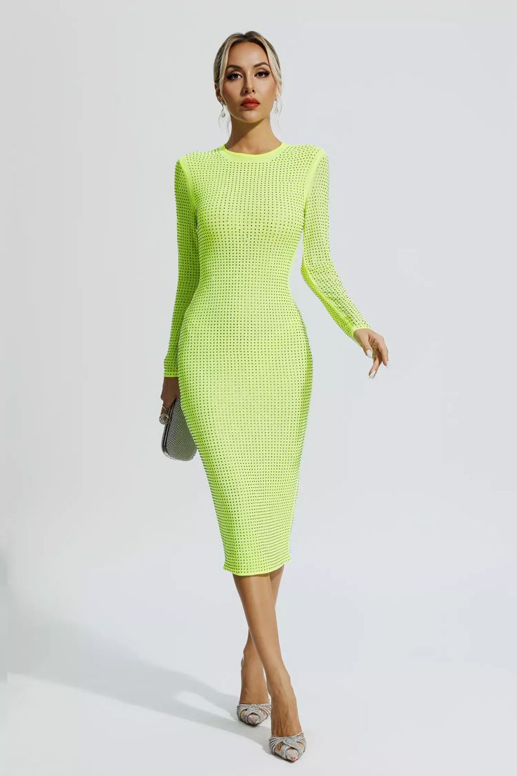 The blockbuster dress for the party, is our Elle Fluorescent Green Crystal Midi Dress. Crafted from gorgeous, heavy-duty, high-quality fabric, this dress features ultra-shine and delicate crystal embellishments all over. Under the light, it will sparkle and add chic charm to you. Whether attending a banquet or a wedding scene, this dress is your best choice.Dress Length: Approx 118cmMaterials: NylonGentle Dry Clean OnlyModel is 5 ft 74 and wears size SColour may vary due to lighting on images. Textured Bodycon Dress, Glitter Wedding Dress, Bandage Midi Dress, Wedding Scene, Floral Shirt Dress, Puff Sleeve Dresses, Green Crystal, Maxi Knit Dress, Maxi Dresses Casual