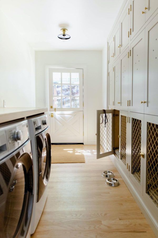 a washer and dryer in a white room