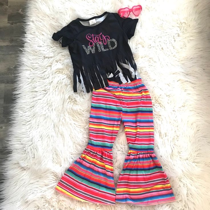 Stay Wild Sweet Girl In This Fun Boutique Outfit! Serape Striped Bells Topped Off With A Fringe Top! What?! 95% Cotton 5%!Spandex More Razels! Razels.Etsy.Com Playful Black Sets For Spring, Playful Black Spring Sets, Elizabeth Elliott, Bell Bottom Outfit, Bell Bottom Outfits, Black Fringe Top, Bell Bottoms Outfit, Fringe Clothing, Baby Halloween Outfits