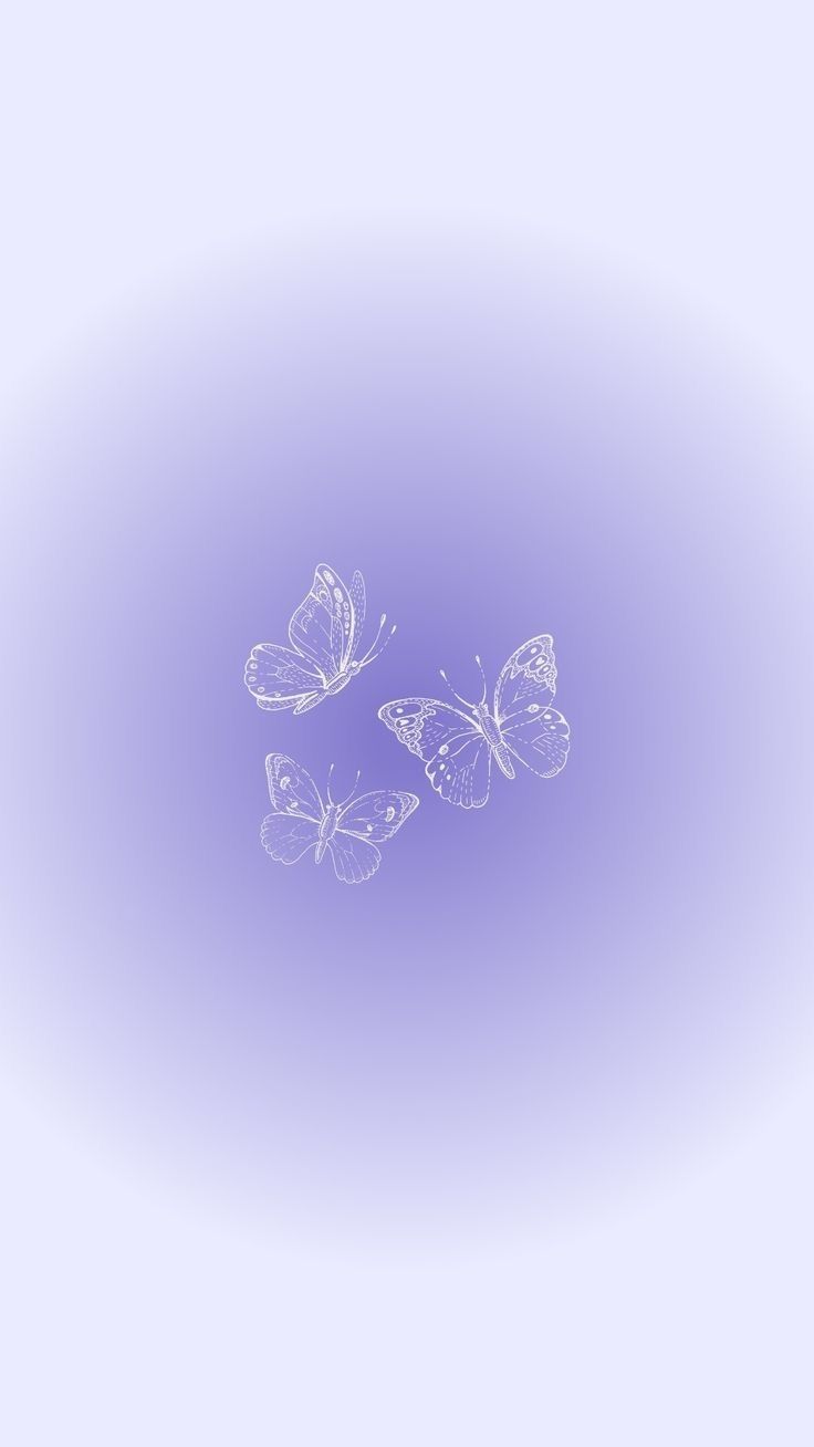 three butterflies flying in the air on a purple background