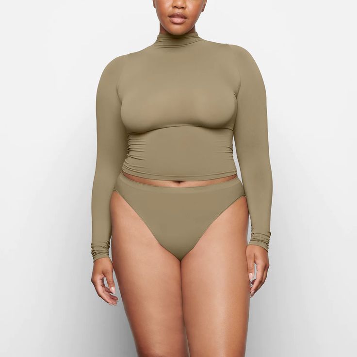 Soft Smoothing Turtleneck Top - Army Green | SKIMS Layered Turtleneck, Turtleneck Shirt, Turtleneck Top, Boyfriend T Shirt, Long Sleeve Turtleneck, Mock Turtleneck, Long Sleeve Tees Women, Cotton Tank Top, Turtle Neck Top