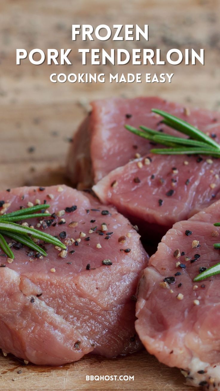 four pieces of frozen pork on a cutting board with rosemary sprigs and seasoning