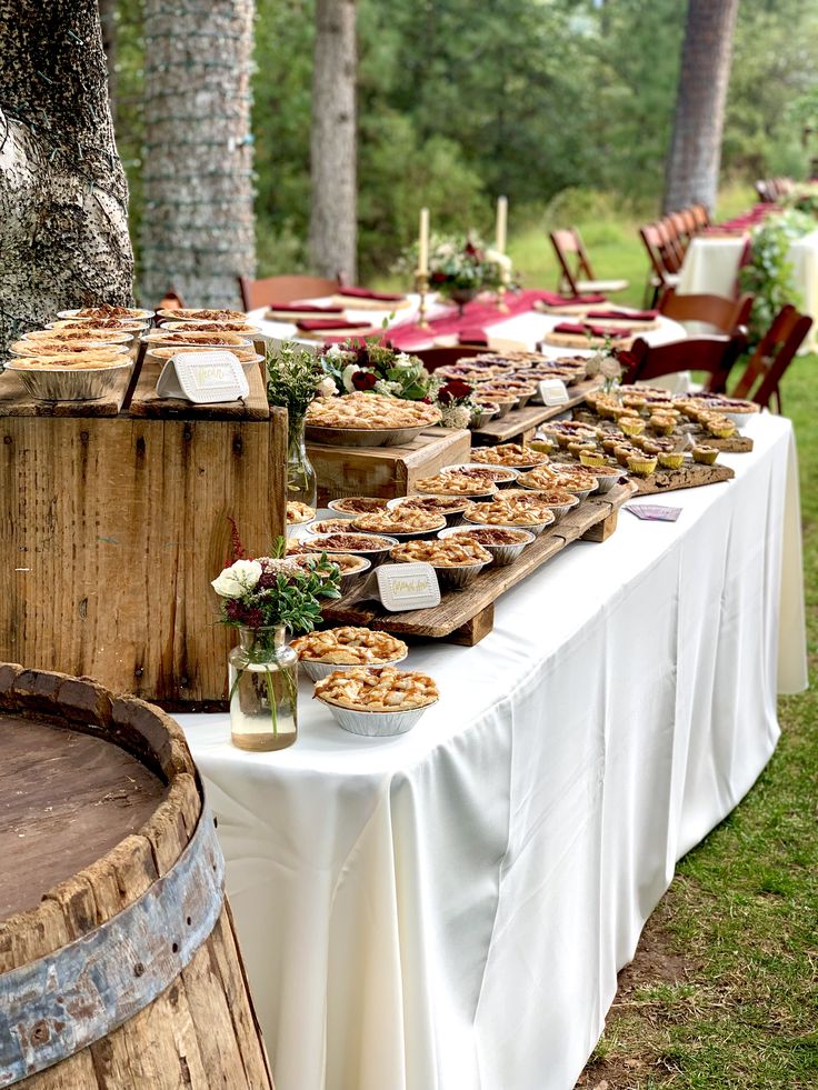 a table full of pies and pastries on it