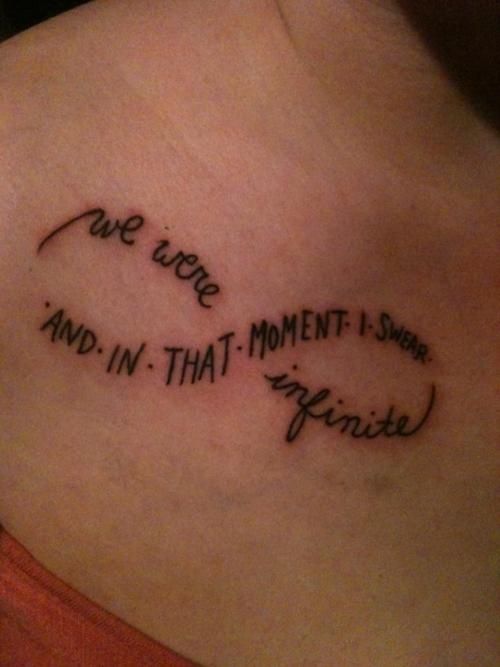 a woman's back with a tattoo saying we are one and in that moment i see infinite