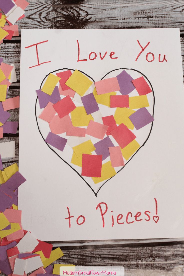 i love you to pieces made with construction paper and colored crepe paper on a piece of wood