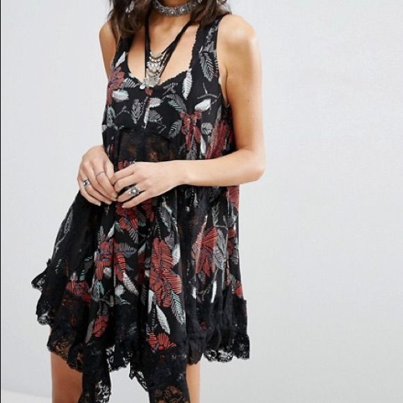 Hello Everyone! I Have A Nwt Free People She Swings Slip Dress. Twist On An Fp Classic, This Extra Swingy Slip Features A Sweet Print With Lace Inserts And An Uneven Hem. A Sheer Style Wear On Its Own Or Pair With One Of Our Signature Seamless Styles To Complete The Look. Great With A Cardigan Over Top. The Lace Parts Are See Through . You May Need To Put A Slip Or Shape Wear U Underneath. Please Make Sure To Ask All Questions Before Purchase. No Returns. Reasonable Offers Welcome. Thank You! Black Sundress For Festival, Black Bohemian Mini Dress With Floral Print, Bohemian Black Mini Dress With Floral Print, Black Sleeveless Mini Dress For Festival, Black Bohemian Mini Dress For Summer, Black Summer Dress For Festival, Black Sleeveless Bohemian Mini Dress, Bohemian Black Mini Dress, Black Lace Trim Dress For Festival