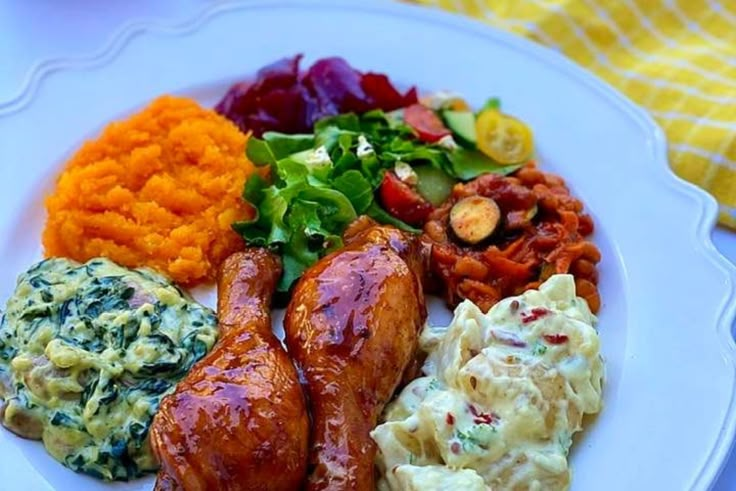 a white plate topped with different types of food