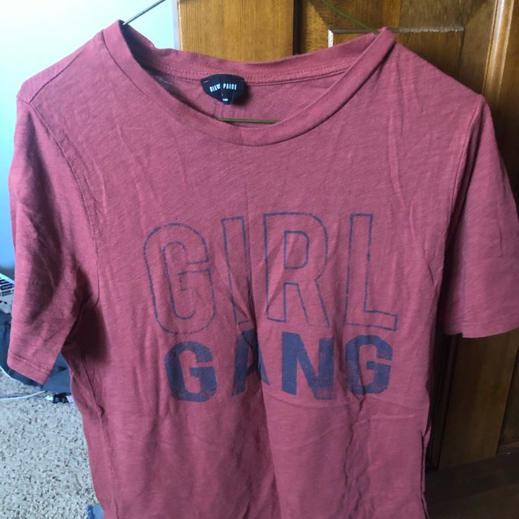 Girl Hand T-Shirt. Never Worn. Maroon Trendy Red Tops With Screen Print, Red Shirt With Text Print For Spring, Spring Red Shirt With Text Print, Trendy Red Shirt With Screen Print, Trendy Red Cotton Shirt, Red Cotton Trendy Shirt, Red T-shirt With Text Print For Fall, Red Screen Print Shirt For Spring, Red Graphic Tee For Fall