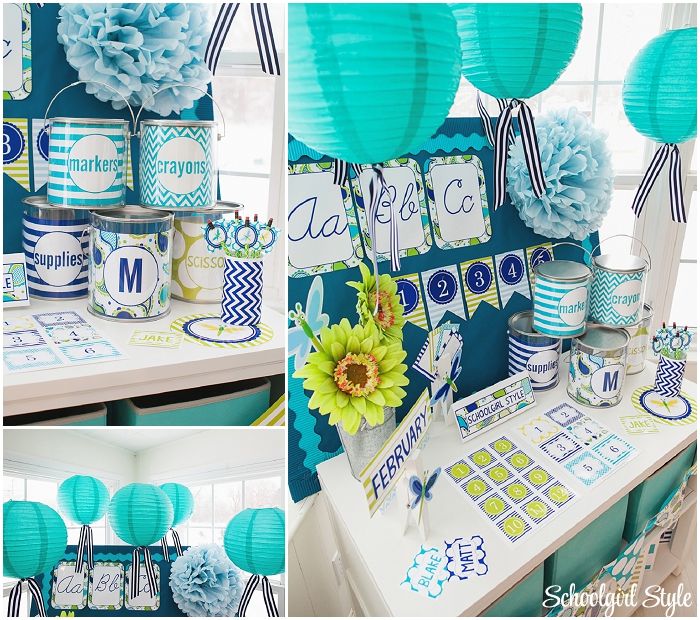 a table with blue and green decorations, paper lanterns and tissue pom poms