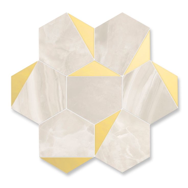 a white and yellow tile with hexagonal shapes