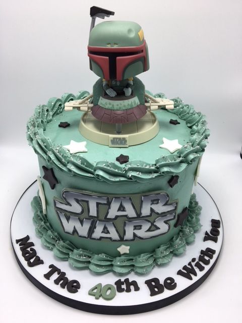 a star wars themed birthday cake with the number forty on it's top and an image of boba fett