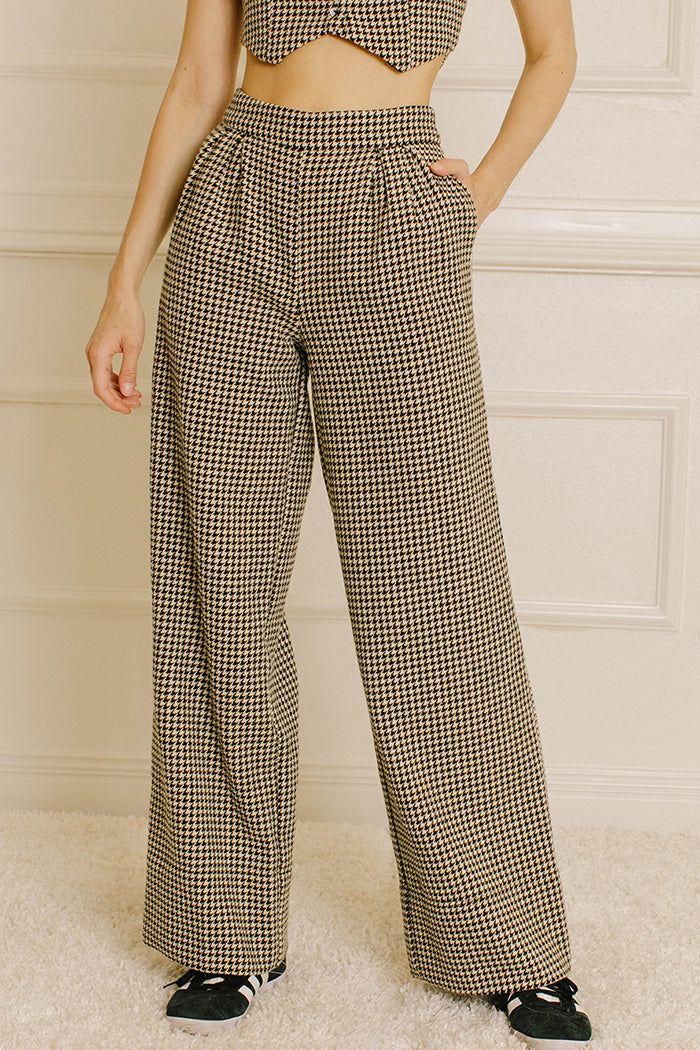 Andrea Houndstooth High-Rise Pant Front Trendy Houndstooth Bottoms For Fall, Trendy Houndstooth Pattern Bottoms For Fall, Houndstooth Straight Pants For Fall, Straight Pants With Houndstooth Pattern For Fall, Casual Houndstooth Bottoms For Business, Casual Houndstooth Bottoms For Business Casual, Casual Houndstooth Pattern Bottoms For Business, Business Casual Wide Leg Houndstooth Bottoms, Wide-leg Dress Pants With Elastic Waistband For Fall