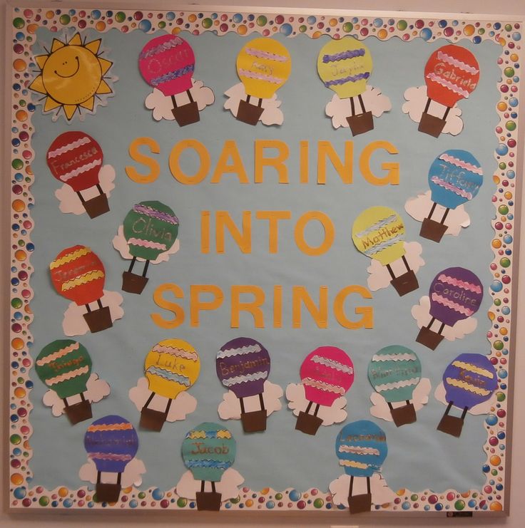 a bulletin board that says soaring into spring