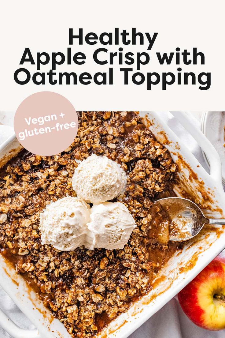 an apple crisp with oatmeal topping in a white dish on a table