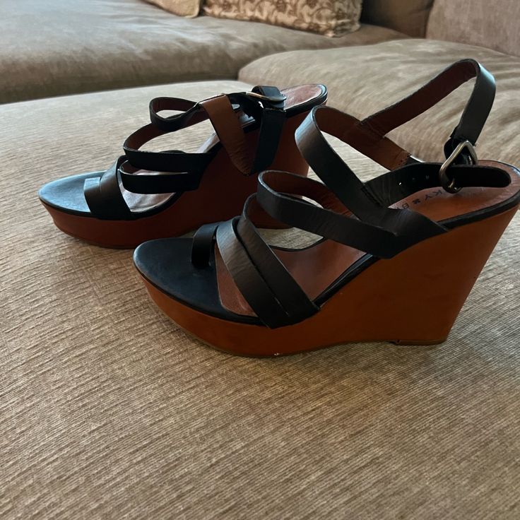 Size 9, Never Worn. Wedge Heel Black Wedge Sandals With Wooden Heel, Black Wedge Heels With Wooden Heel, Modern Black Wedge Sandals With Wooden Heel, Lucky Brand Shoes, Brand Shoes, Womens Shoes Wedges, Wedge Heels, Lucky Brand, Wedges