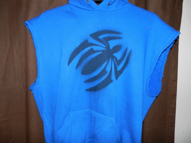 a blue hoodie with an image of a bird in the middle on it's back