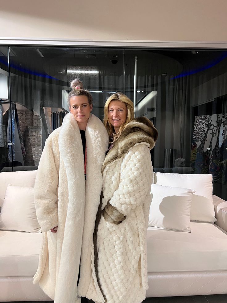 Indulge in the pinnacle of sophistication with our Thick Faux Fur Winter Long Sleeve robe. This masterpiece of fashion effortlessly combines opulence and style, ensuring you radiate timeless elegance in every setting. Whether you're navigating daily life, attending work commitments, cherishing family gatherings, embracing casual outings, savoring dinner dates, embarking on vacations, reveling in cocktail parties, or even gracing weddings, this robe adapts seamlessly. Its versatility transcends o Luxury Cream Fur Coat For Winter, Luxury Faux Fur Winter White Outerwear, White Hooded Fur Coat For Fall, Luxury White Fur Coat For Winter, Luxury White Winter Fur Coat, Luxury White Outerwear With Faux Fur Lining, White Luxury Faux Fur Coat, Luxury Winter White Long Sleeve Fur Coat, Luxury White Faux Fur Coat