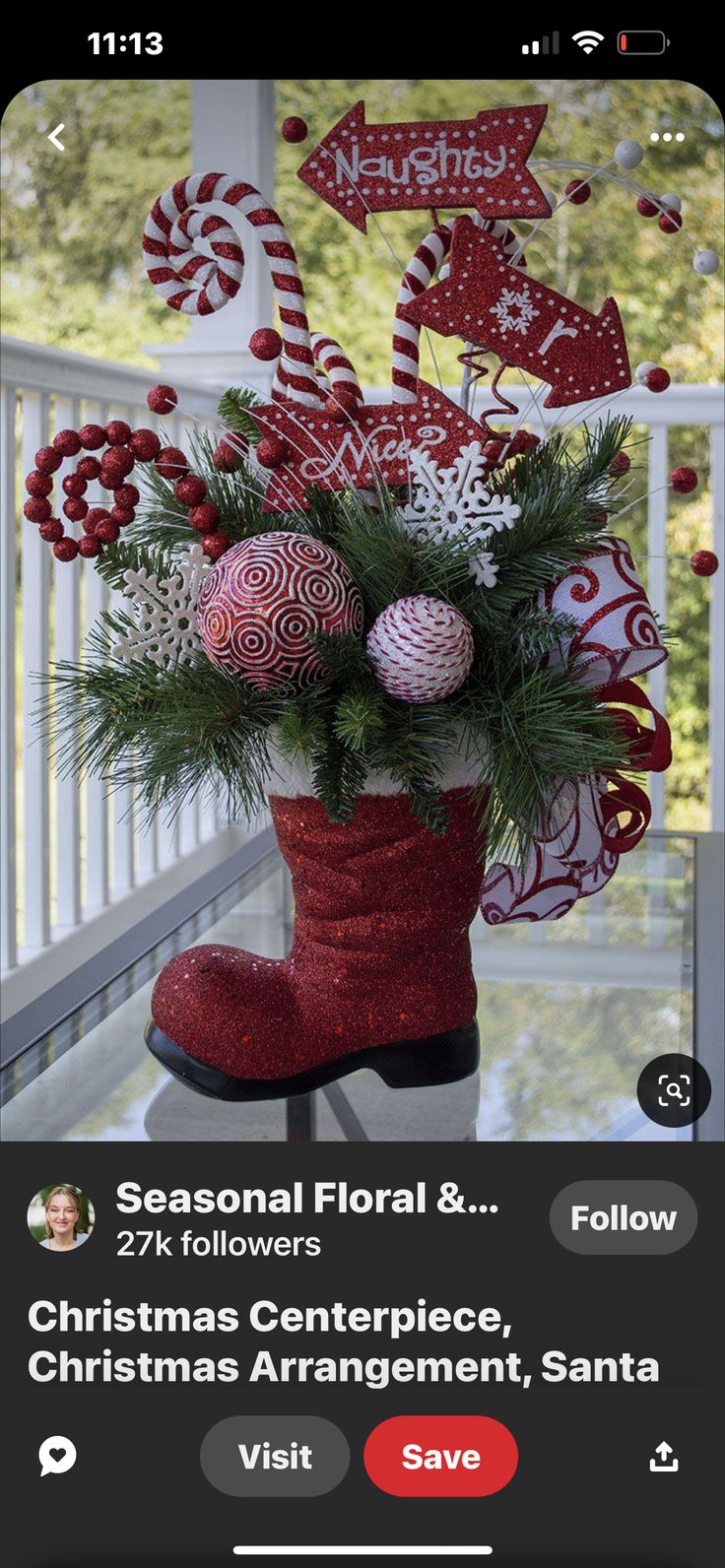 a red boot with christmas decorations on it and the words seasonal floral & gifts below