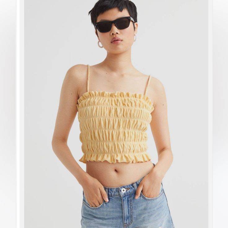 Pale Yellow Crop Top From H&M. Size Medium. Cinched Material With Spaghetti Straps. Brand New With Tags. Terry Cloth Material. Chic H&m Tank Top For Summer, Chic H&m Summer Tank Top, Chic Summer H&m Tank Top, H&m Summer Beach Tops, H&m Casual Cami Tank Top, Casual H&m Cami Tank Top, H&m Spring Cami Tops, H&m Sleeveless Top For Day Out, H&m Summer Tops For Day Out