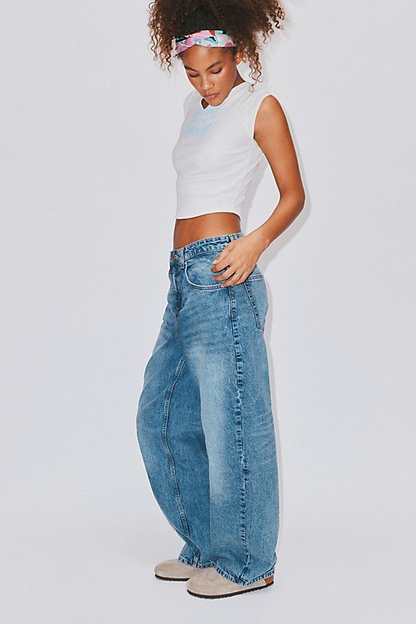 New favorite jeans from BDG – the BDG Bella Baggy Jeans. Overdyed BDG baggy jeans cut in a slouchy with a low-rise that sits comfortably at the hip. Relaxed fit throughout with a baggy silhouette that tapers ever so slightly toward the puddled hem. Complete with contrasting stitching throughout. Urban Outfitters exclusive. Features BDG Bella Baggy Jeans with a slightly tapered leg and overdyed finish Crafted from rigid BDG denim that will soften more and more over time Slouchy low-rise baggy jea Low Rise Baggy Jeans, Baggy Jeans Outfit, Slouchy Jeans, Baggy Jean, Bdg Jeans, Mode Jeans, Loose Fit Jeans, Baggy Jeans, New Wardrobe