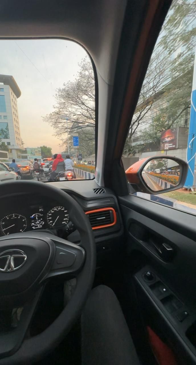 the driver's view of traffic on a busy city street from inside a vehicle