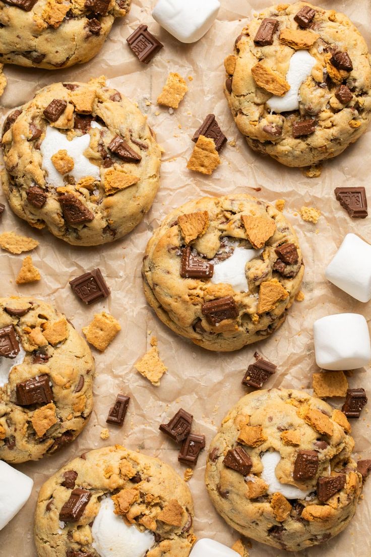 cookies with marshmallows and chocolate chips on parchment paper