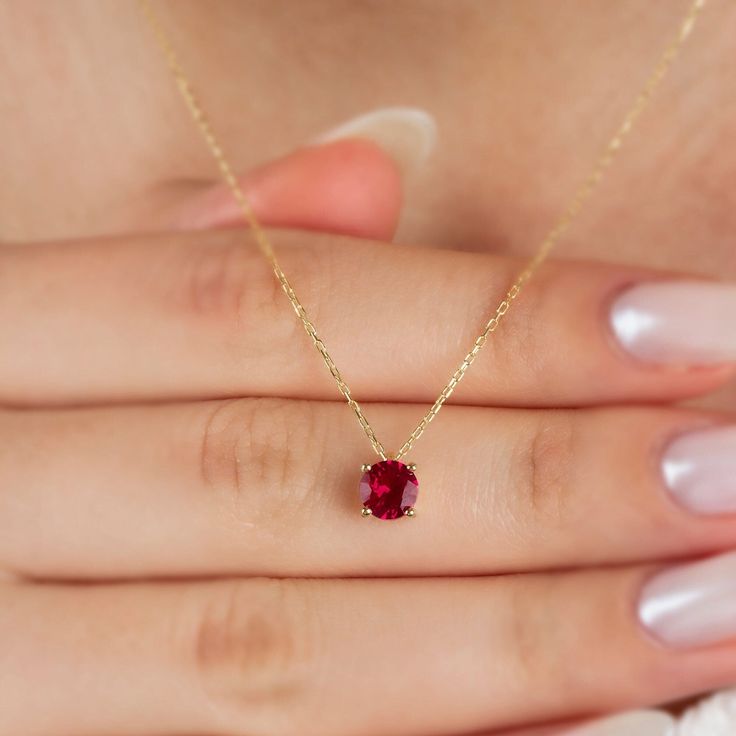 "Ruby red means fire, passion and desire itself. Ruby; Along with luck, it means wealth and success. Our round ruby necklace, with its minimalist design, is a jewel that you can use daily and on special occasions. It is a nice gift for yourself and your loved ones. The birthstone of those born in July is ruby. You are welcome to our store for all our products; https://www.etsy.com/shop/StyleDiamond?ref=seller-platform-mcnav 🔸🔸 Our elegant, style and stylish products suitable for special occasi Red Lab-created Ruby Necklace As Gift, Red Lab-created Ruby Necklace For Gift, Red Lab-created Ruby Necklace Gift, Gift Red Lab-created Ruby Necklace, Fine Jewelry Red Gemstone Birthstone Necklace, Red Gemstone Birthstone Necklace Fine Jewelry, Red Ruby Gemstone Birthstone Necklace, Red Gemstone Birthstone Necklace Gift, Red Birthstone Necklace With Lab-created Ruby