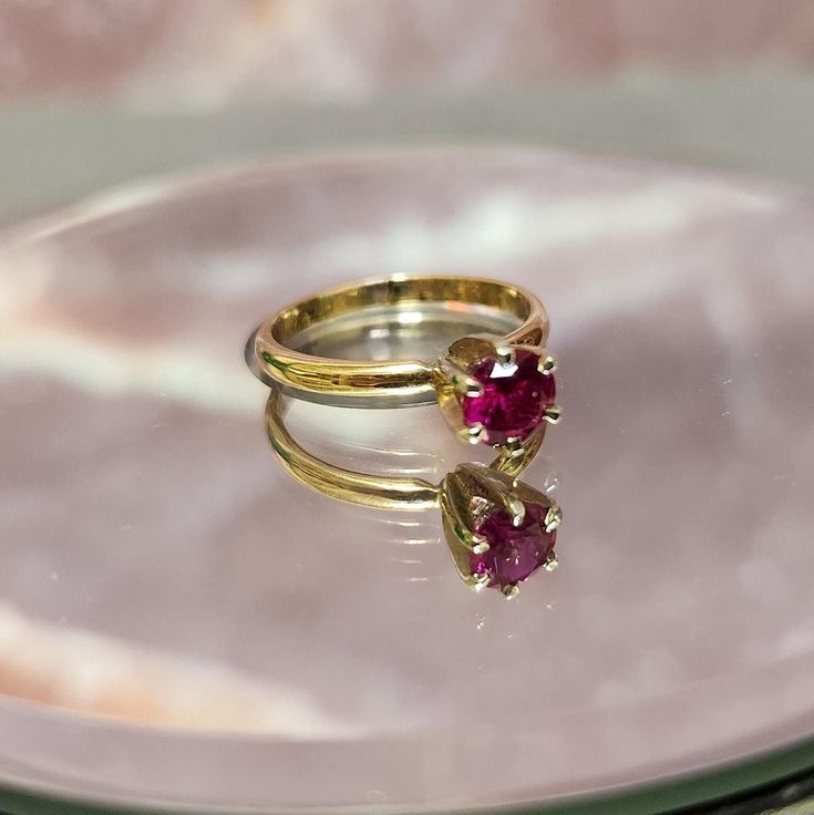 💎 Delicate Ruby Elegance 💎 This stunning vintage 14k gold ring features a beautifully prong-set .5 carat ruby, offering a touch of classic sophistication. Weighing 2.1 grams and sized at 5.5, this fine jewelry piece is the perfect choice for anyone who appreciates the timeless beauty of rubies and the elegance of gold. 🔹 Key Features: Material: 14k Yellow Gold Stone: Prong Set .5ct Ruby Ring Size: 5.5 Weight: 2.1 grams Design: Classic prong setting showcasing a vibrant ruby Condition: Excellent vintage condition with light wear The deep red hue of the ruby is the centerpiece of this delicate ring, securely held in place by a classic prong setting that allows the stone to shine brightly. The slim 14k gold band provides a simple yet elegant foundation, making this ring perfect for daily w Ruby Ring With Vvs Clarity For Formal Occasions, Vvs Clarity Ruby Ring For Formal Occasions, Formal Solitaire Ruby Ring With Round Stone, Classic Red Sapphire Ring With Brilliant Cut, Fine Jewelry Ruby Ring With Brilliant Cut, Classic Red Ruby Ring With Prong Setting, Ruby Birthstone Ring With Prong Setting For Formal Occasions, Ruby Birthstone Ring With Prong Setting For Formal Events, Formal Ruby Birthstone Ring With Prong Setting