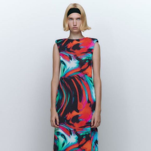 Round Neck Sleeveless Midi Dress With Shoulder Pads. Contrasting Inner Lining. Side Slits At Hem. Outer Shell 95% Polyester 5% Elastane Lining 95% Polyester 5% Elastane. Brand New With Tags. Armpit To Armpit 13” Length 49” Sleeveless Midi Dress With Vibrant Print For Party, Chic Sleeveless Mini Dress With Vibrant Print, Vibrant Sleeveless Maxi Dress With Vibrant Print, Sleeveless Dress With Vibrant Print For Evening, Sleeveless Dresses With Vibrant Print For Evening, Sleeveless Evening Dress With Vibrant Print, Multicolor Sleeveless Dress For Summer Evening, Blue Sleeveless Midi Dress With Vibrant Print, Chic Sleeveless Midi Dress With Vibrant Print