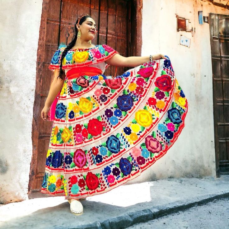 The Beautiful Chiapaneca Dress Is A Masterpiece From The Chiapas Artisans! Fully Handmade With Vivid Floral Silky Shiny Embroidery, It's A Favorite For Mexican Fiestas! The Campesina Off The Shoulder Top Is Made With A Shoulder Adjustable String. The Skirt Is Also Adjustable To Most Sizes. We Recommend This Set For Sizes S, M, L, Xl. Contact Us If You Need A Larger Size. The Embroidery Covers The Entire Skirt And Blouse, Back And Front. Please Consider That The Embroidery Colors Will Always Be D Chiapas Skirt, Traditional Multicolor Dress For Fiesta, Traditional Multicolor Fiesta Dress, Multicolor Floral Print Dress For Fiesta, Multicolor Maxi Dress For Spring Fiesta, Multicolor Spring Maxi Dress For Fiesta, Spring Fiesta Multicolor Maxi Dress, Multicolor Bohemian Maxi Dress For Fiesta, Multicolor Short Sleeve Dress For Fiesta