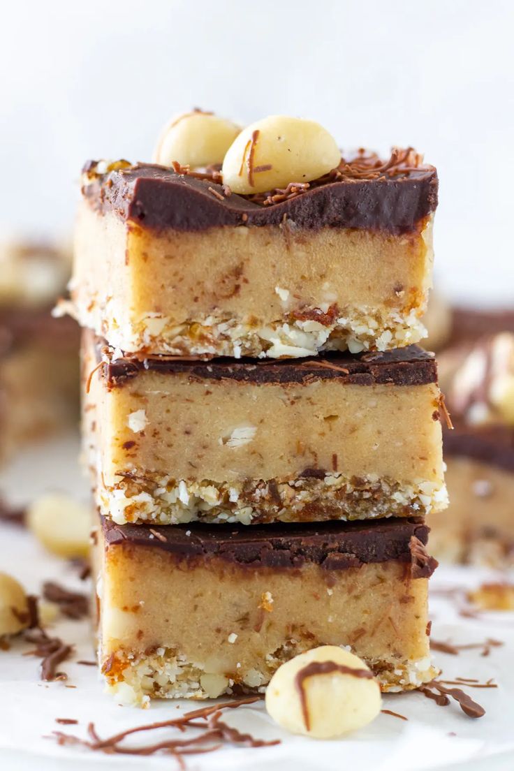 three pieces of raw caramel slice stacked on top of each other with the text overlay