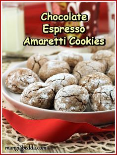 chocolate espresso amarettii cookies in a white bowl with red ribbon on the side