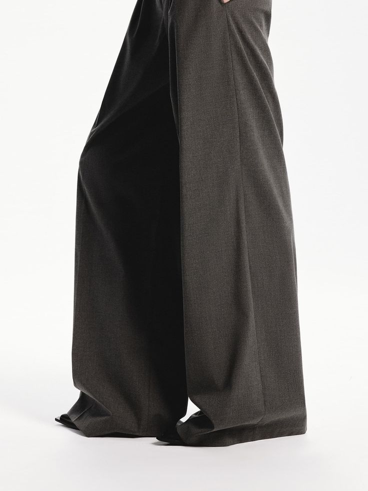 MO&Co. Women's Pleated Wide Leg Pants Crafted from well-done fabric, these wide-leg pants have been designed to fall loosely over the body. With convenient side slip pockets and a front pleated design that creates a flattering silhouette. Features : - Relaxed wide-leg silhouette- Side slip pockets, back welt pockets- Front pleated design Code: MBD3PATT03The back length of size M is 108cmMATERIALS & CARE Material: 66.8% Polyester 30.9% Viscose 2.3% SpandexPlease put it into a mesh bag to wash.REM Pleated Wide Leg Pants, Mesh Bag, Welt Pockets, The Body, Welt Pocket, Leg Pants, Wide Leg Pants, Black Pants, Black And Grey