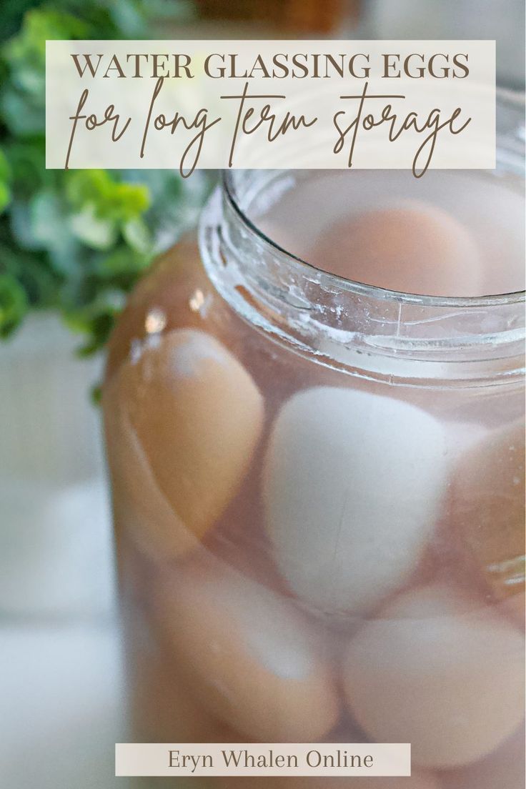 a jar filled with eggs sitting on top of a table