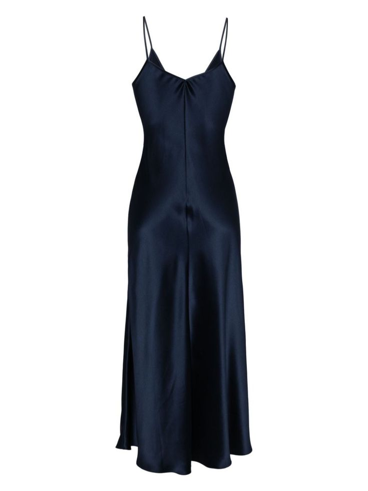 Find VOZ V-neck Slip Silk Dress on Editorialist. navy blue silk V-neck spaghetti straps slip silhouette mid-length straight hem We've partnered with Good On You — an independent agency that rates how brands perform in relation to their impact on the planet, people and animals, with a multi-criteria rating simplified to a five points scale. In order to be awarded our conscious label, larger brands need to score a minimum of four out of five ('Good'), while smaller brands must score at least three out of five ('It's a start'). This item comes from a brand rated four out of five ('Good') by Good on You at the time it was added on FARFETCH. Please note, this is a brand-level rating and does not guarantee that this product is made with conscious materials. Learn more about what makes a product Sleek V-neck Slip Dress For Formal Occasions, Blue Fitted Slip Dress With Sleek Style, Blue Fitted Sleek Slip Dress, Sleek Fitted Blue Slip Dress, Silk V-neck Slip Dress For Formal Occasions, Formal Silk V-neck Slip Dress, Blue Silk Slip Dress For Night, Chic Blue Silk Slip Dress, Blue Bias Cut Slip Dress For Date Night