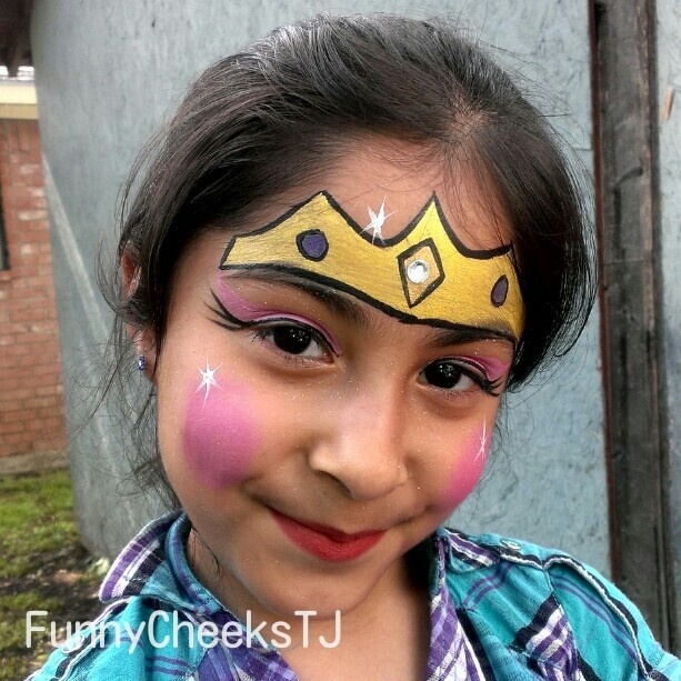 Princess crown face painting Princess Peach Face Paint, Simple Face Painting Ideas For Adults, Disney Princess Face Paint Easy, Christian Face Paint, Crown Face Paint, Crown Face Painting, Face Painting Crown, Easy Princess Face Paint, Princess Face Paint