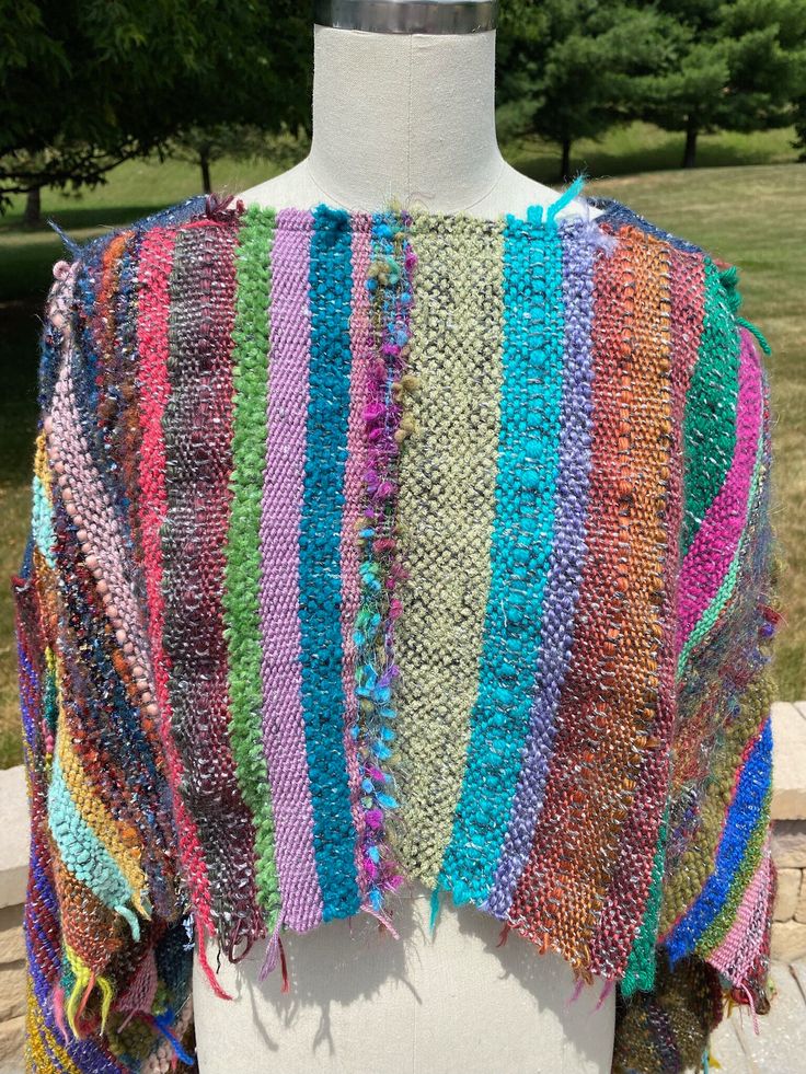 Artisan Multicolor One Size Poncho, Artisan Multicolor Poncho One Size, Winter Woven Poncho One Size, Artisan Poncho For Fall, Artisan Poncho For Fall One Size, Artisan Handwoven Poncho, One Size, Fall Woven Shawl Poncho, Multicolor Handwoven Shawl For Fall, One Size Woven Poncho Shawl